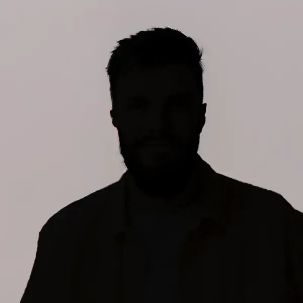A dark silhouette of a man with short hair and a beard is shown against a light background, representing an Alcohol Recovery Mindset Coaching Case Study. His facial features and clothing details are not visible.